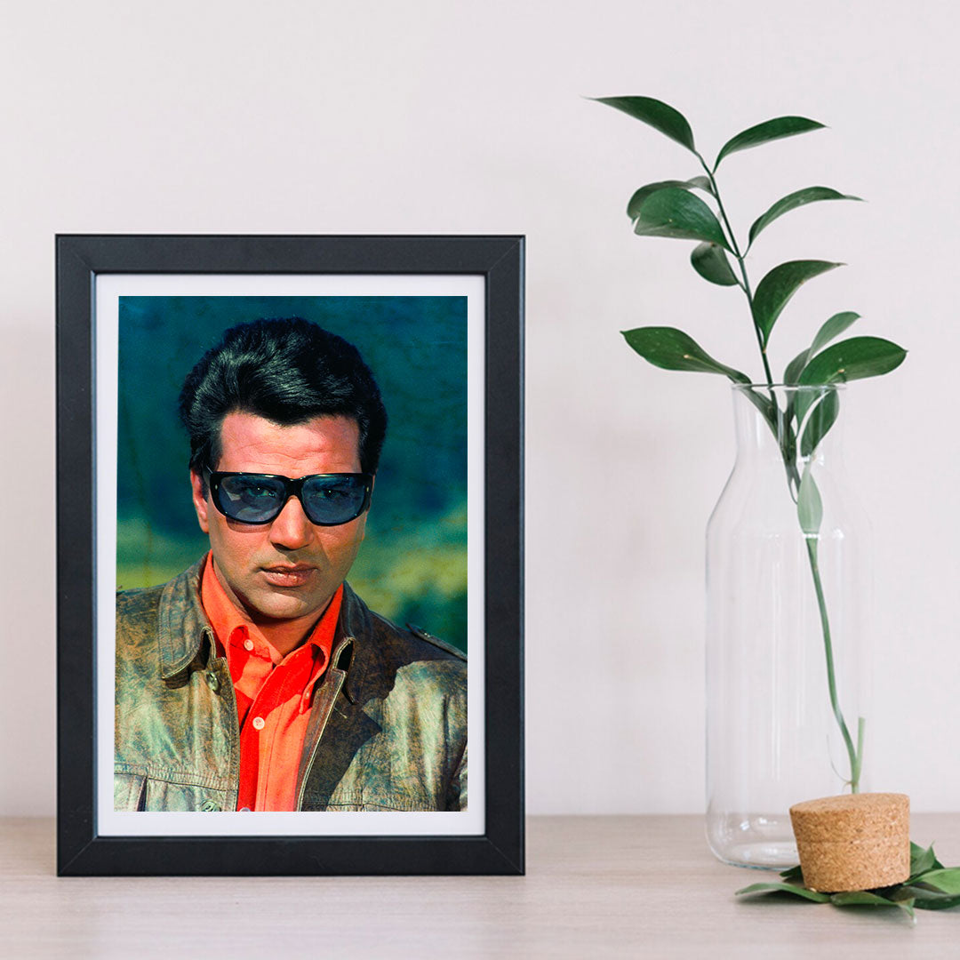 Dharmendra Portrait in a Orange Shirt and Brown Jacket with Gogles- still from the movie “Lalkar” Personal Bollywood Photography of renowned cinematographer, Shri Prem Sagar.