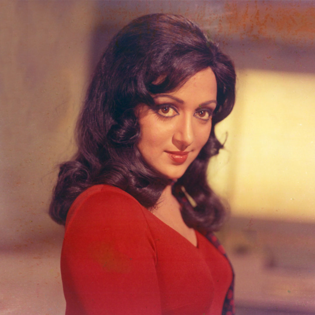 Hema Malini Portrait in a red long elegant dress - still from the movie “CHARAS” Personal Bollywood Photography of renowned cinematographer, Shri Prem Sagar
