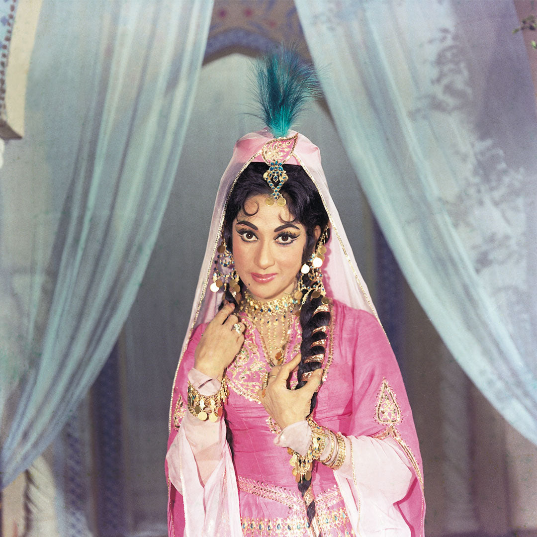 Mala Sinha in a Violet dress with golden jwellery Portrait - still from the movie, “GEET” Personal Bollywood Photography of renowned cinematographer, Shri Prem Sagar.